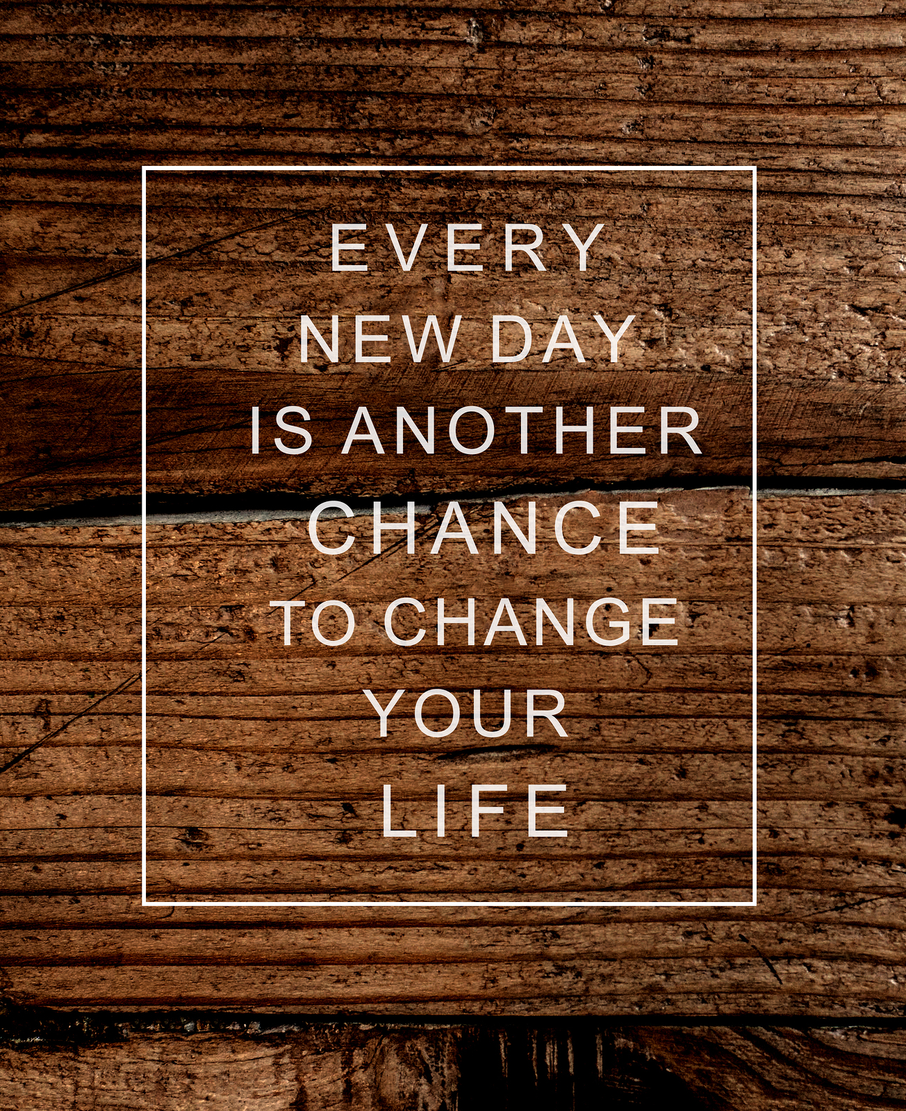 Motivational poster quote on rustic wooden background EVERY NEW DAY IS ANOTHER CHANCE TO CHANGE YOUR LIFE. Concept image